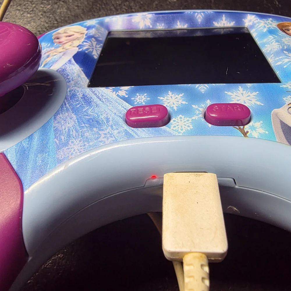 Frozen Bilingual Handheld Game Console - Purple and Blue 100 Games